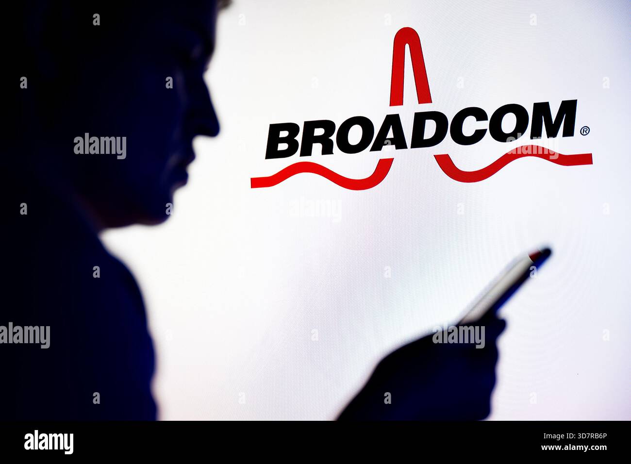 In this photo illustration, a Broadcom logo is seen displayed on TV ...