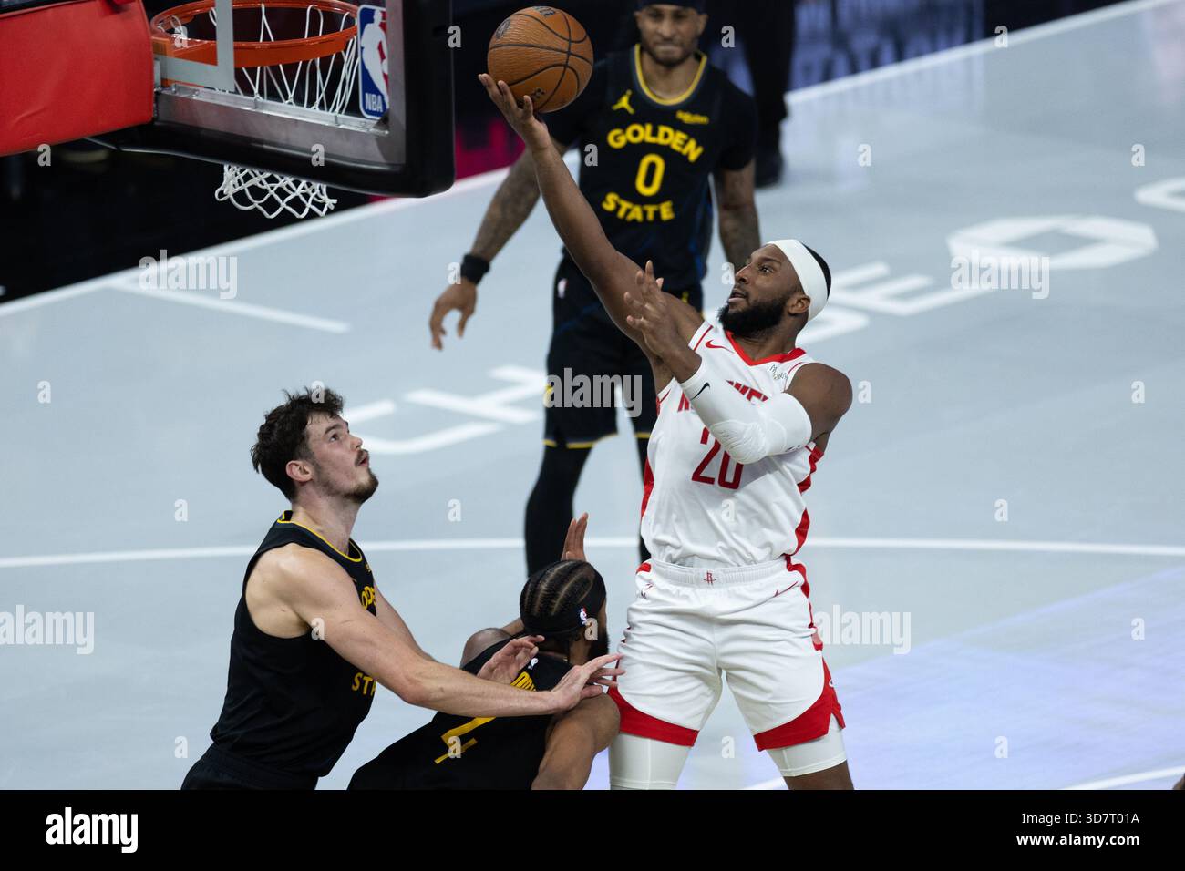 Houston Rockets guard Josh Okogie shoots during the first half of an ...