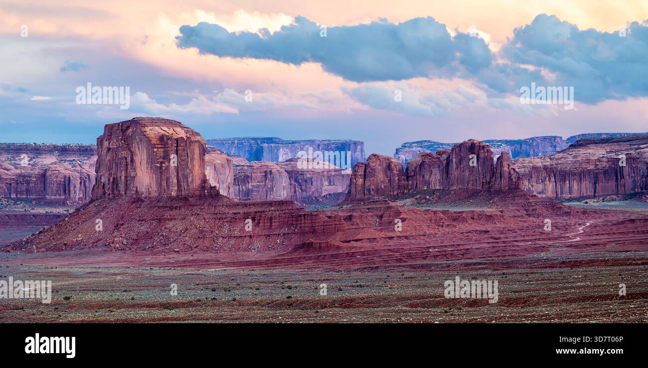 Monument Valley sunset US landscape - butte and red rock sandstone formations - southwest USA Arizona & Utah - United States Navajo national park Stock Photo