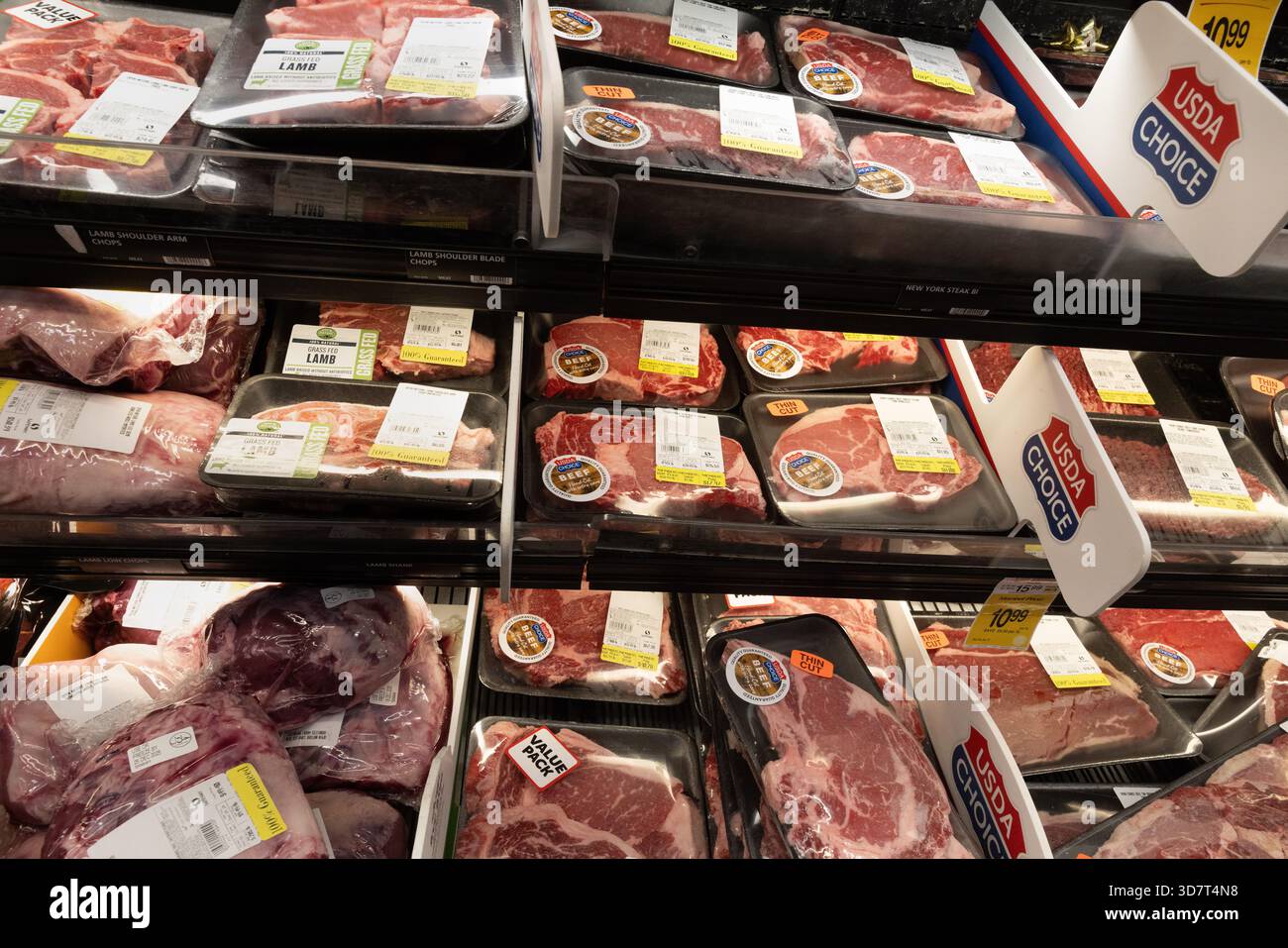 Packaged Beef and Lamb Cuts in Grocery Store Meat Section Stock Photo