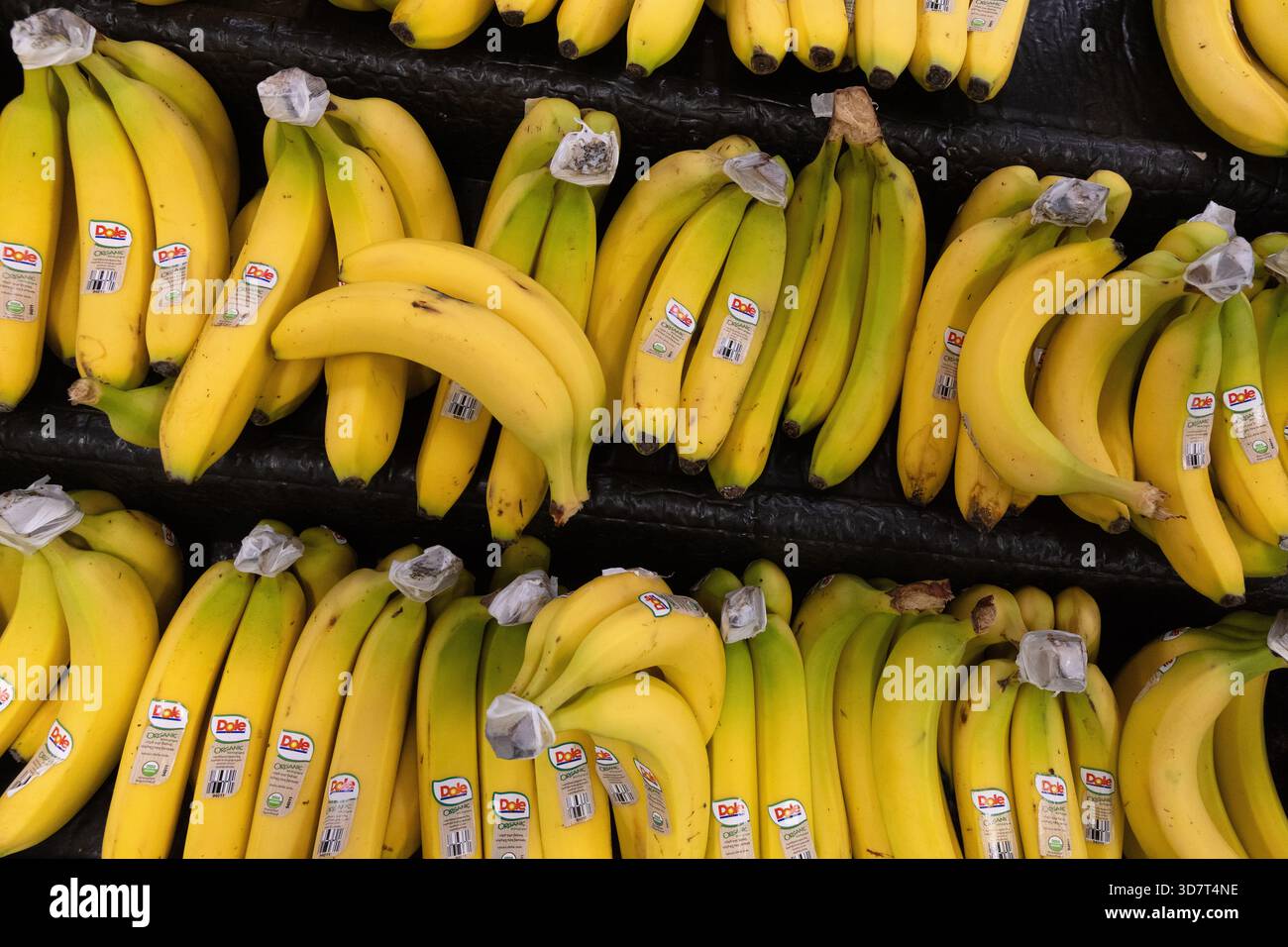 Bananas on display at a grocery store hi-res stock photography and images -  Alamy