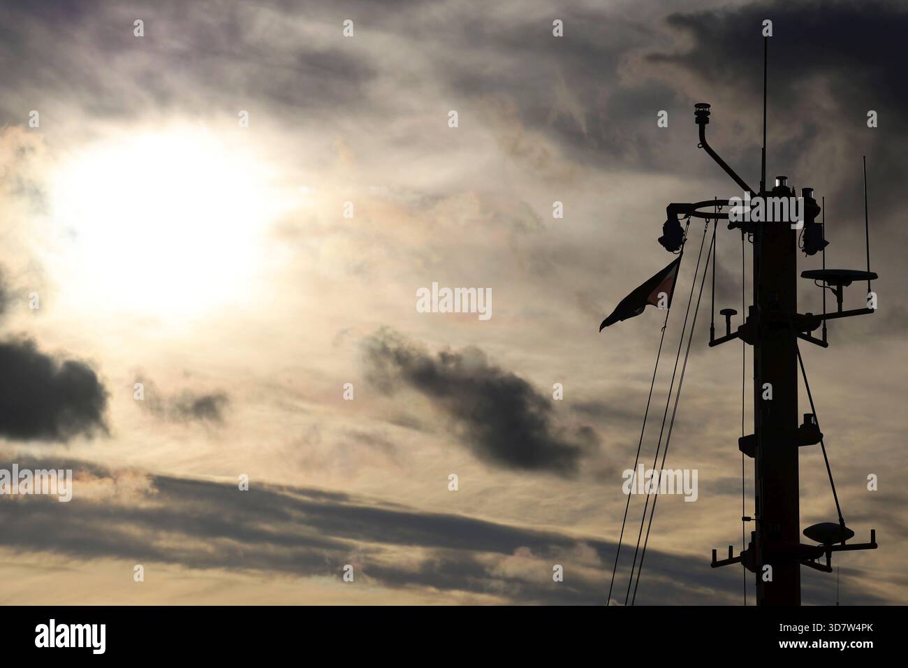 Ship Mast Silhouette Against a Dramatic, Cloudy Sky Stock Photo - Alamy