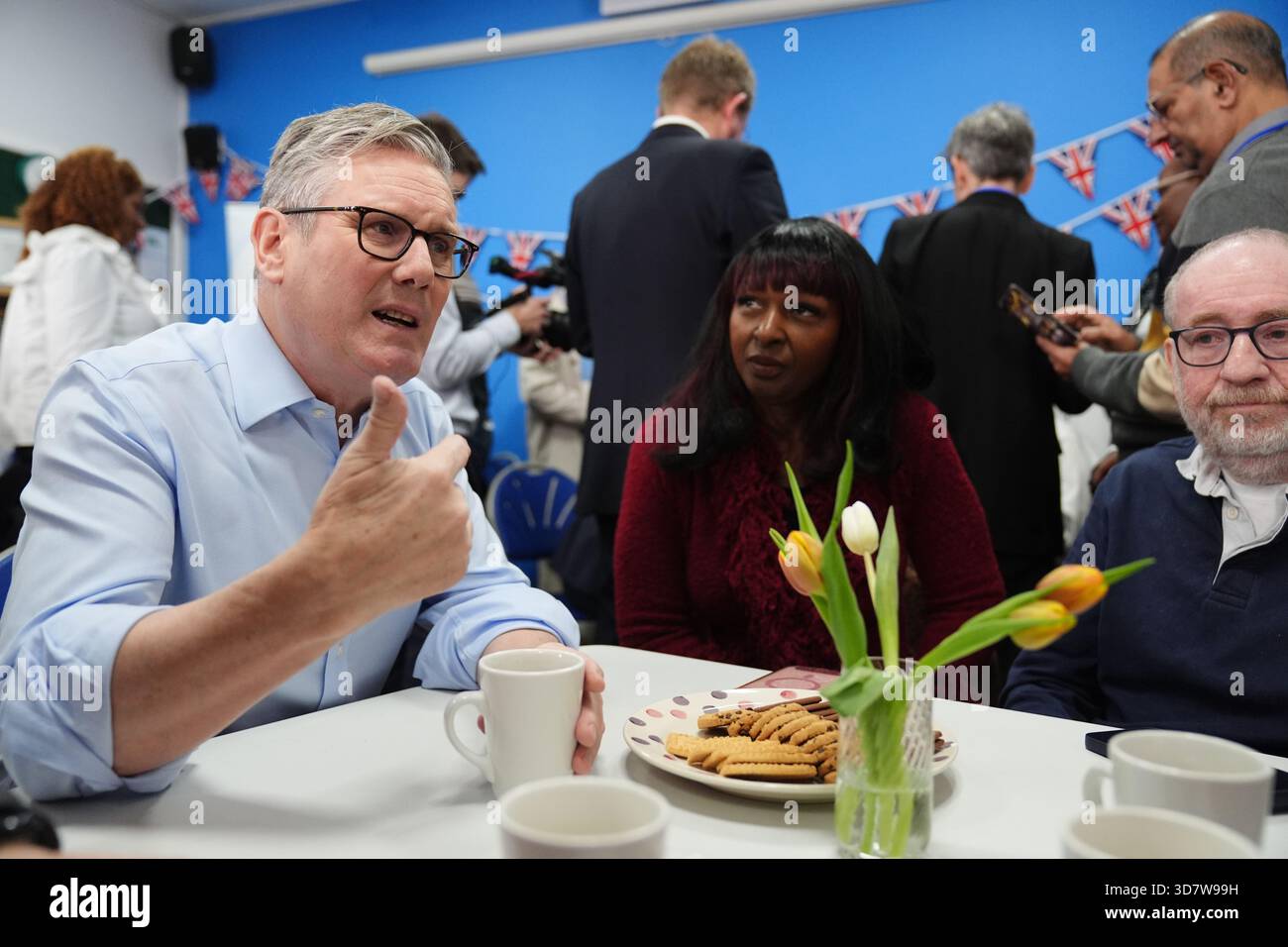 British Prime Minister Keir Starmer speaks with guests during a visit ...