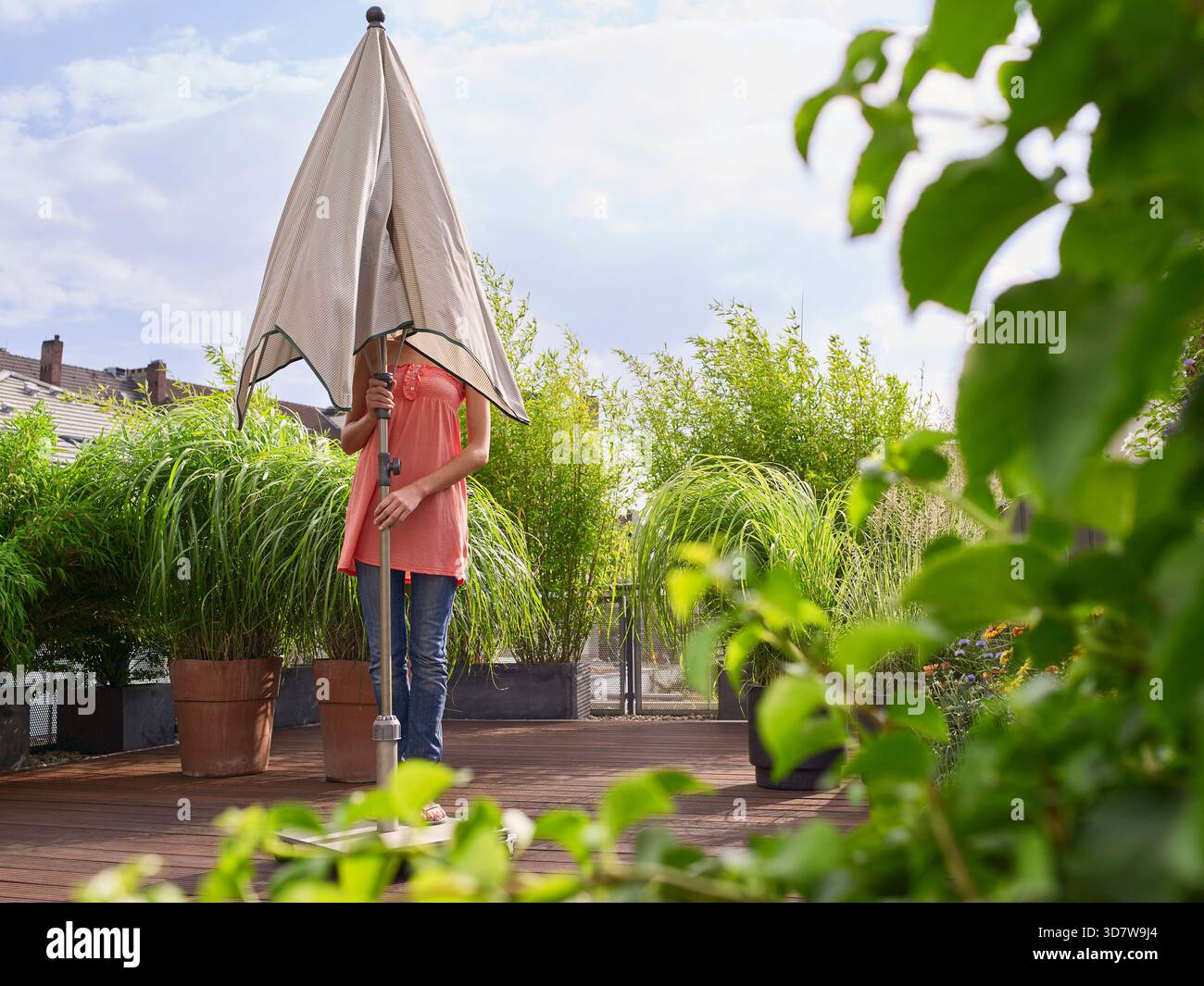 enclosed patio umbrella Closed patio umbrella hi-res stock photography and images