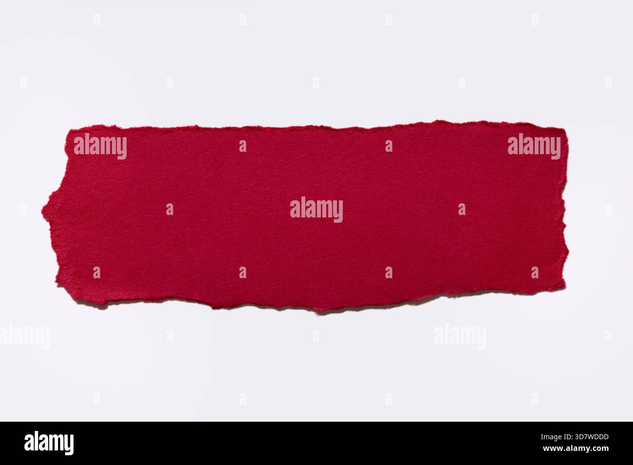 Torn red paper on white background Stock Photo