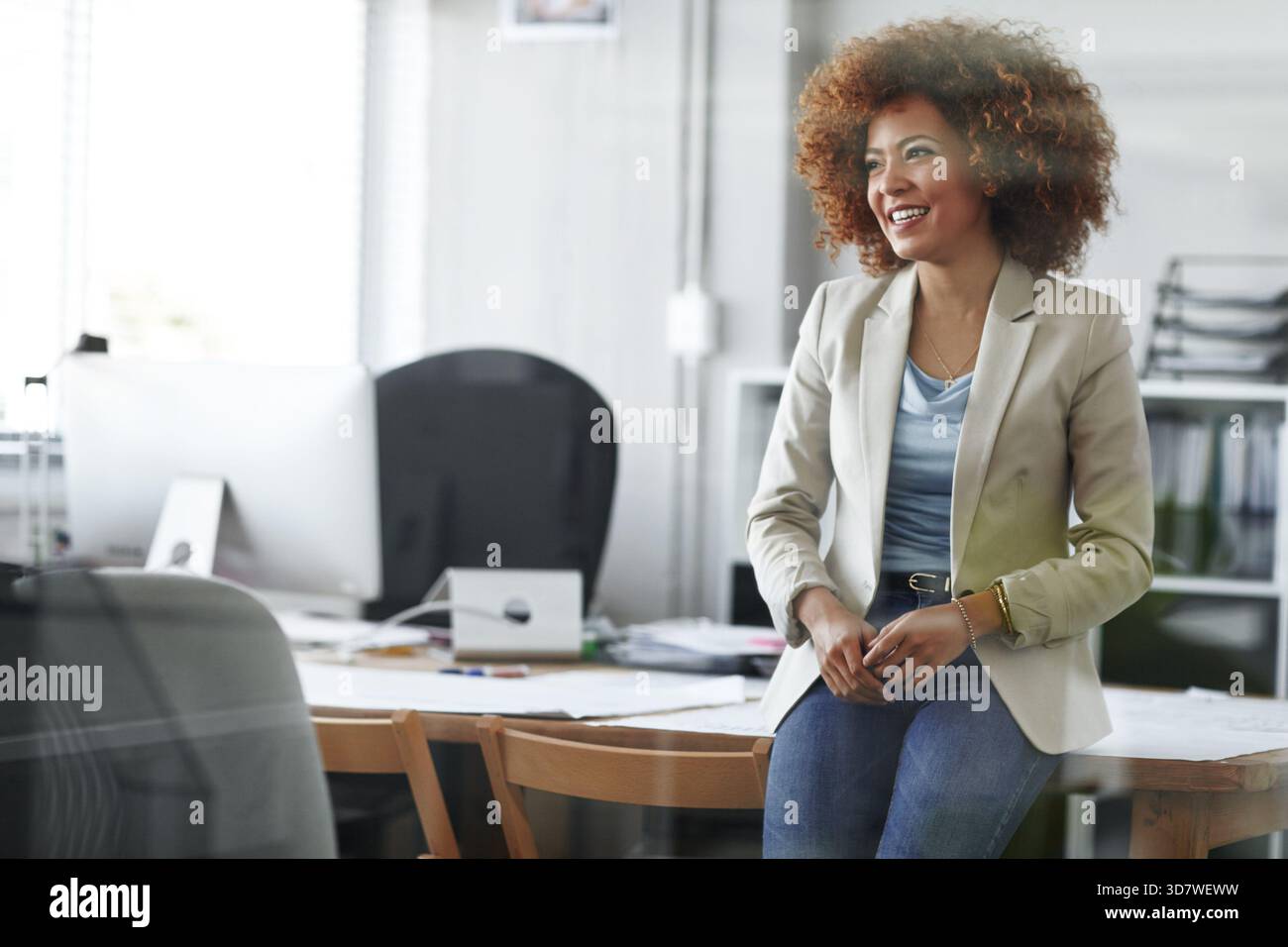 Happy woman administrator thinking hi-res stock photography and images ...