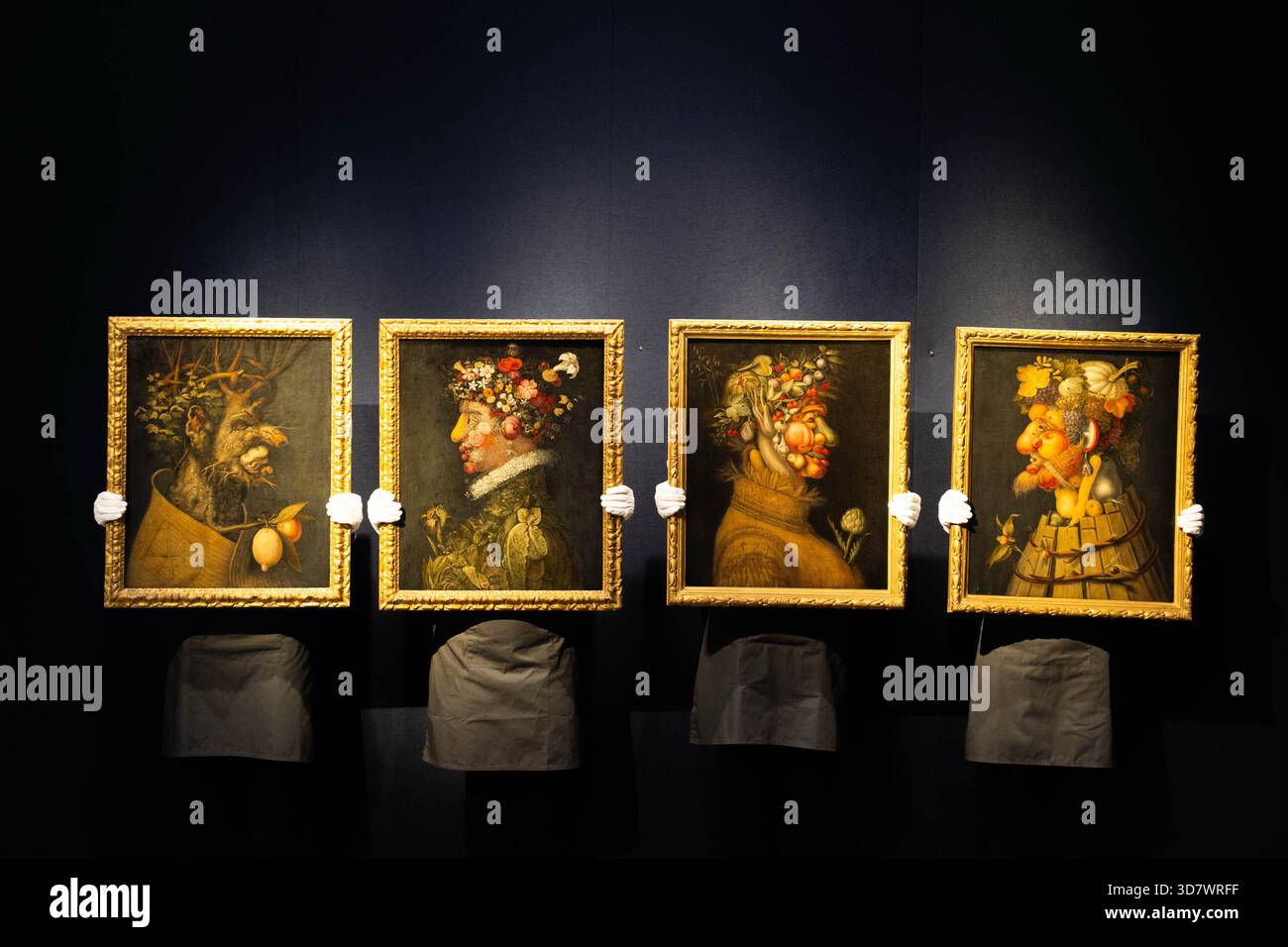 Gallery staff hold 'The Four Seasons' by the Workshop of Giuseppe ...