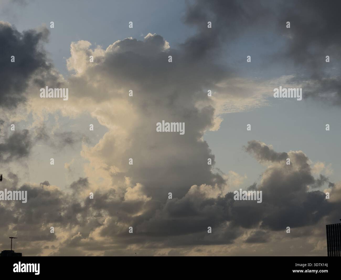 Dramatic towering storm clouds rising above the skyline in Mumbai - Smartphone Captured Stock Image