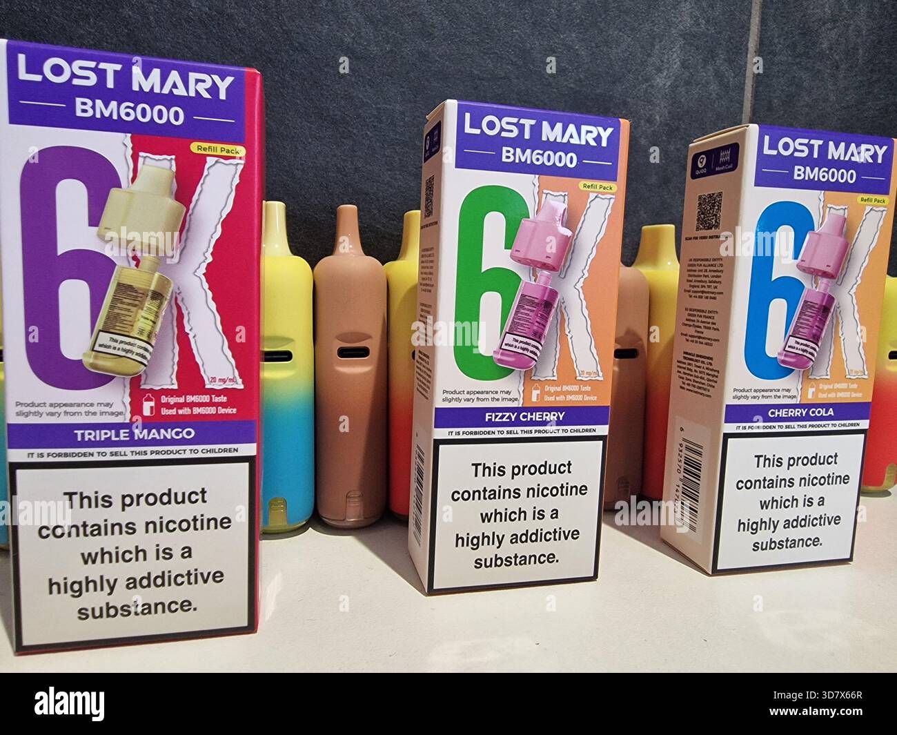 Durham, UK - 27 November 2025: Lost Mary Vapes BM6000. Re-fillable vape  with disposal vapes in the background. Vaper, smoking, habit, plastic  concern Stock Photo - Alamy