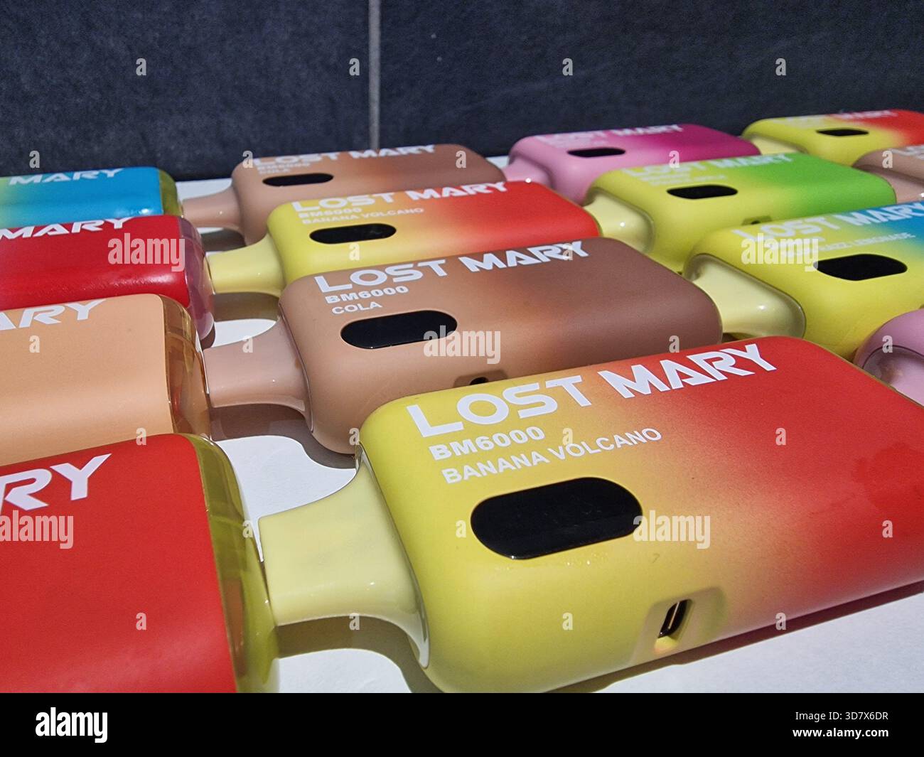 Durham, UK - 27 November 2025: Lost Mary Vapes BM6000. Re-fillable vape  with disposal vapes in the background. Vaper, smoking, habit, plastic  concern Stock Photo - Alamy