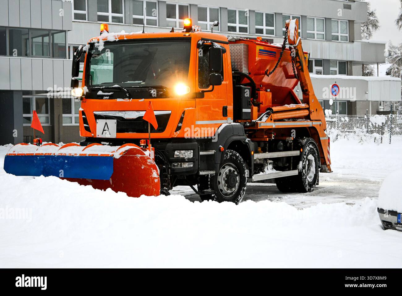 Snowplow truck plowing road, removing snow during winter weather Stock ...