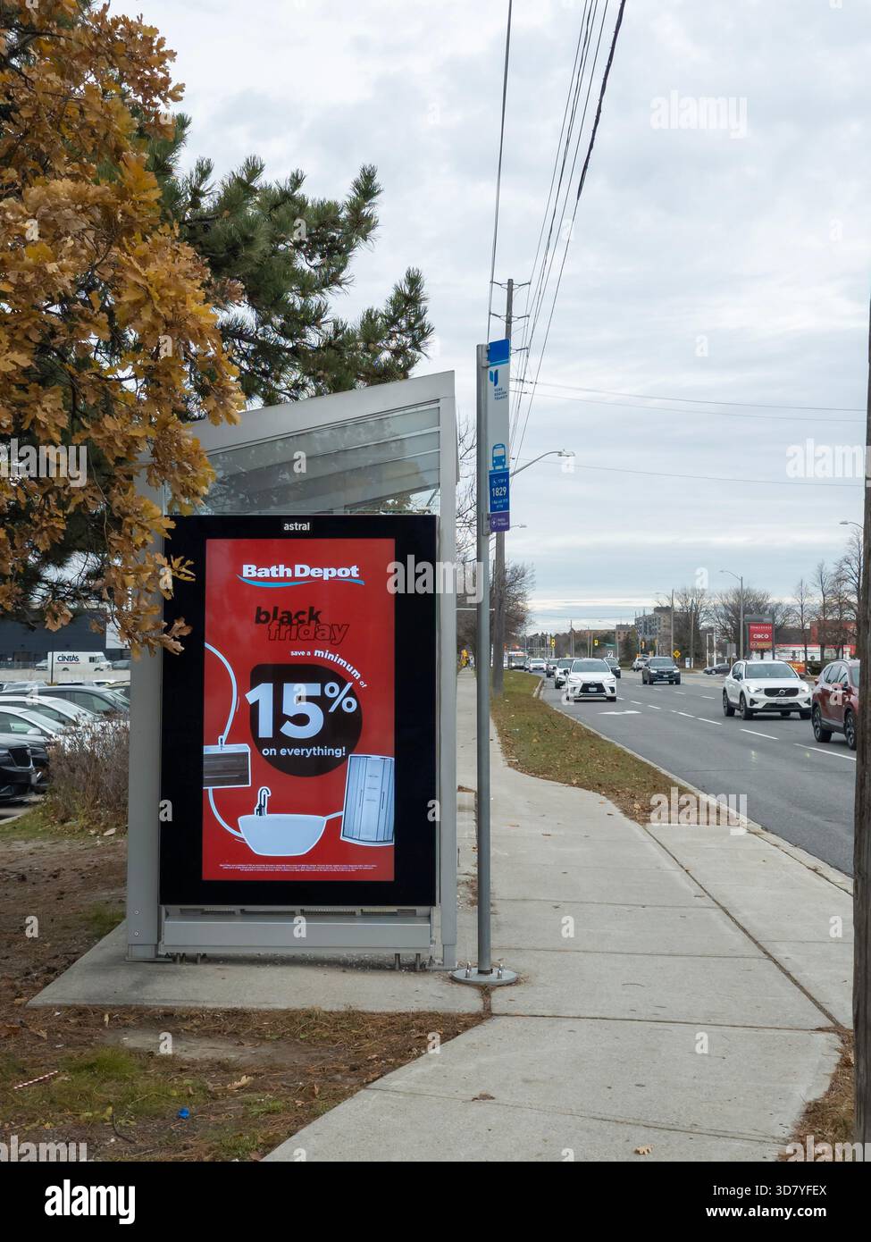 Bath Depot bus stop ad promotes Black Friday sale with 15% off everything on red background. - Smartphone Captured Stock Image