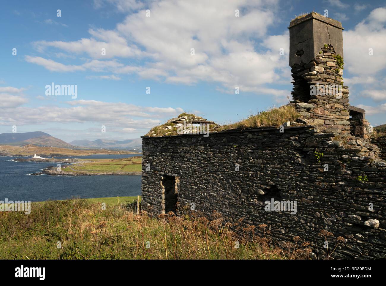 Stone cottage ruin on Valentia island on the Skellig ring in County Kerry in the Munster region of Ireland Stock Photo