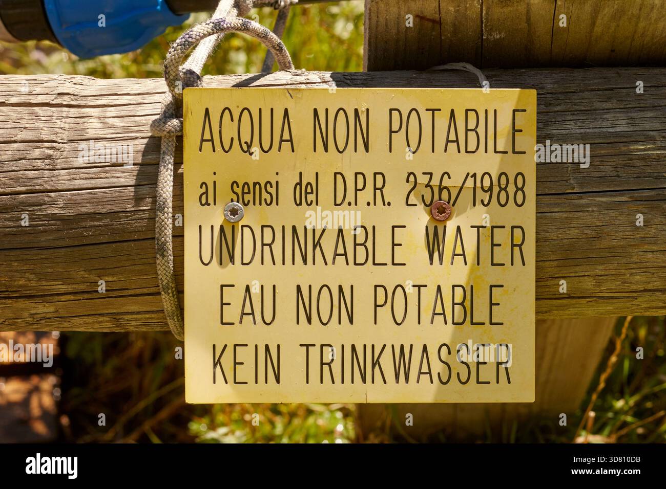Water not drinkable sign at a mountain hut in the Italian Alps. Stock Photo
