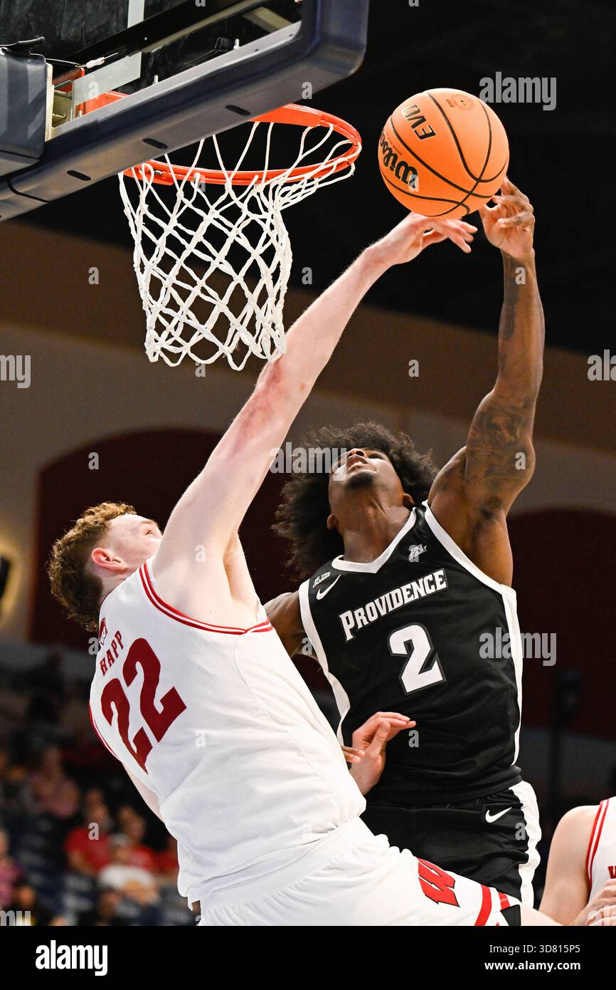Wisconsin forward Austin Rapp (22) blocks a shot by Providence guard ...