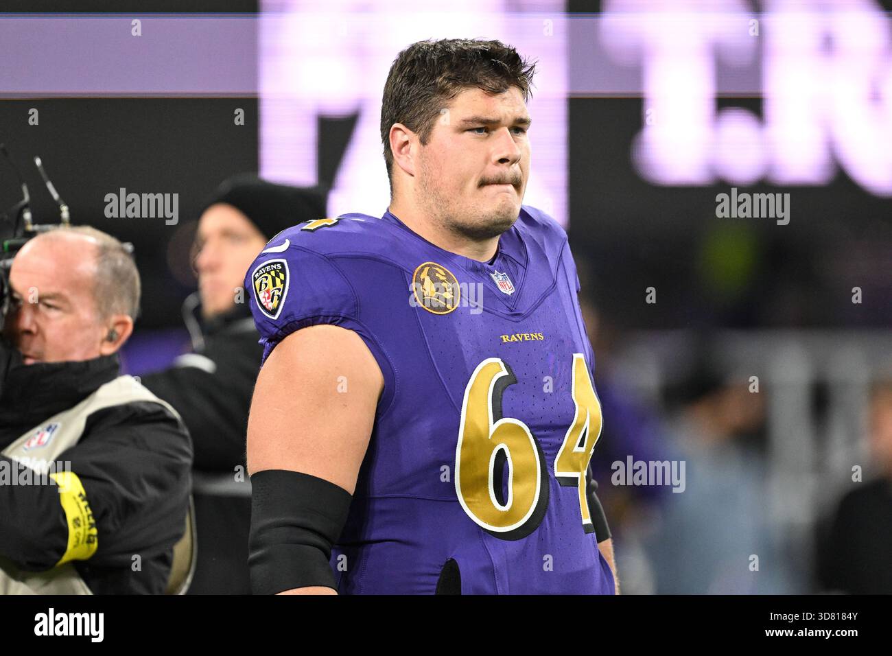 Baltimore Ravens center Tyler Linderbaum (64) looks on during pre-game ...