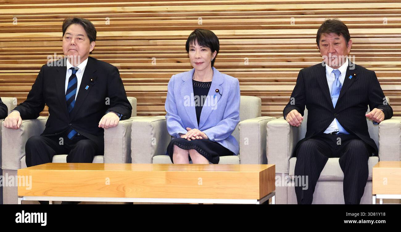 Japanese Prime Minister Sanae Takaichi (center) attends a cabinet ...