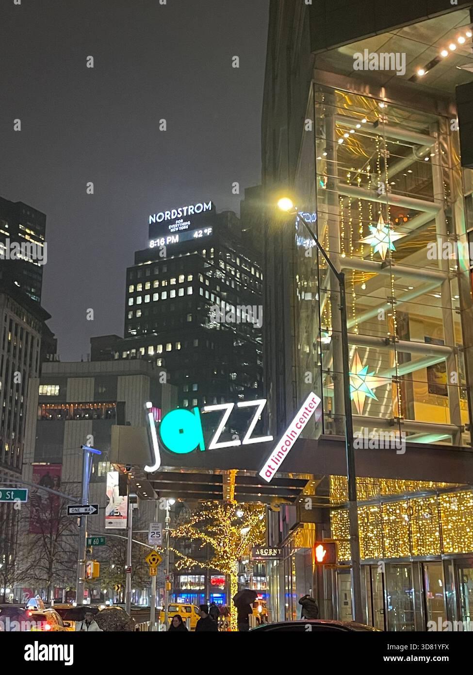 Manhattan glows through the rain—city lights shimmering in the night. - Smartphone Captured Stock Image