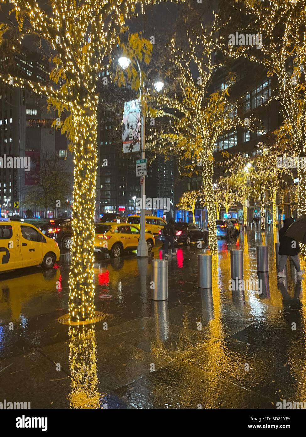 Manhattan glows through the rain—city lights shimmering in the night. - Smartphone Captured Stock Image