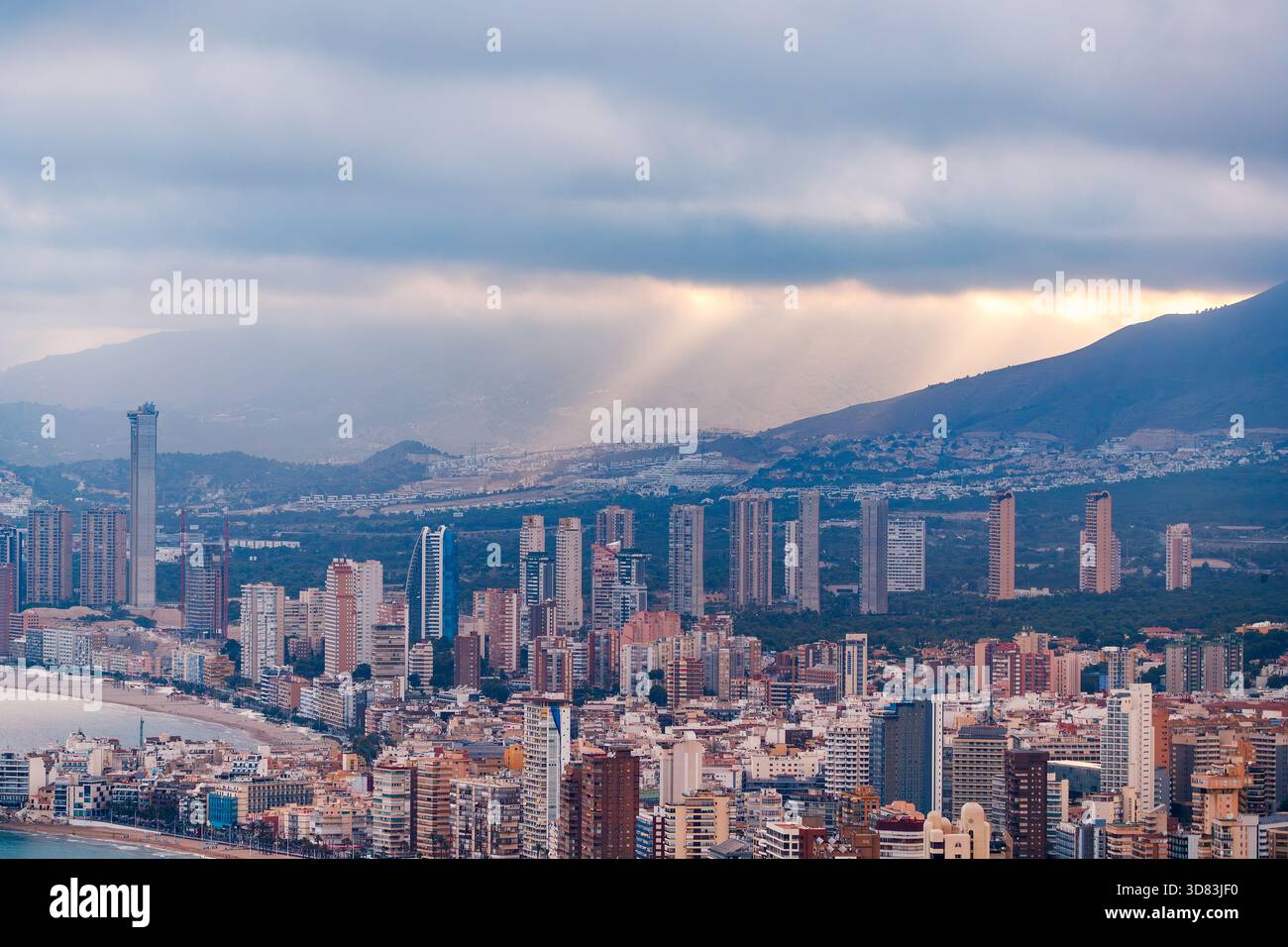 Benidorm Skyline with Dramatic Sun Rays Stock Photo