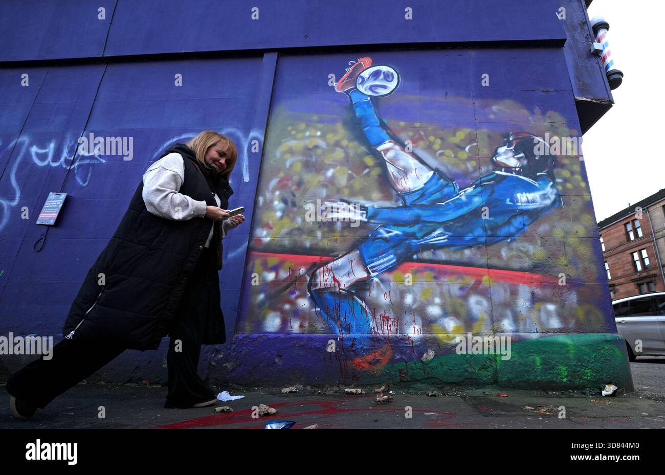 a-mural-of-scott-mctominay-scoring-an-overhead-kick-on-andrews-street