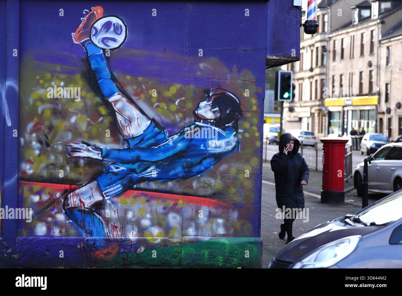 a-mural-of-scott-mctominay-scoring-an-overhead-kick-on-andrews-street