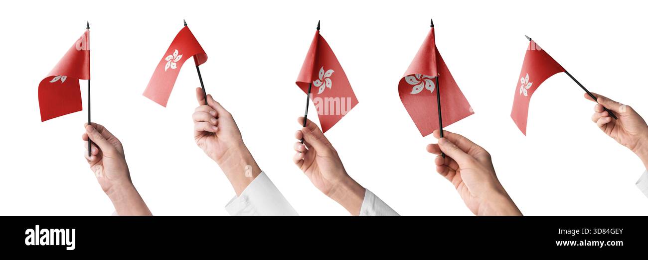 People wave both the flags of China and Hong Kong at a handover 
