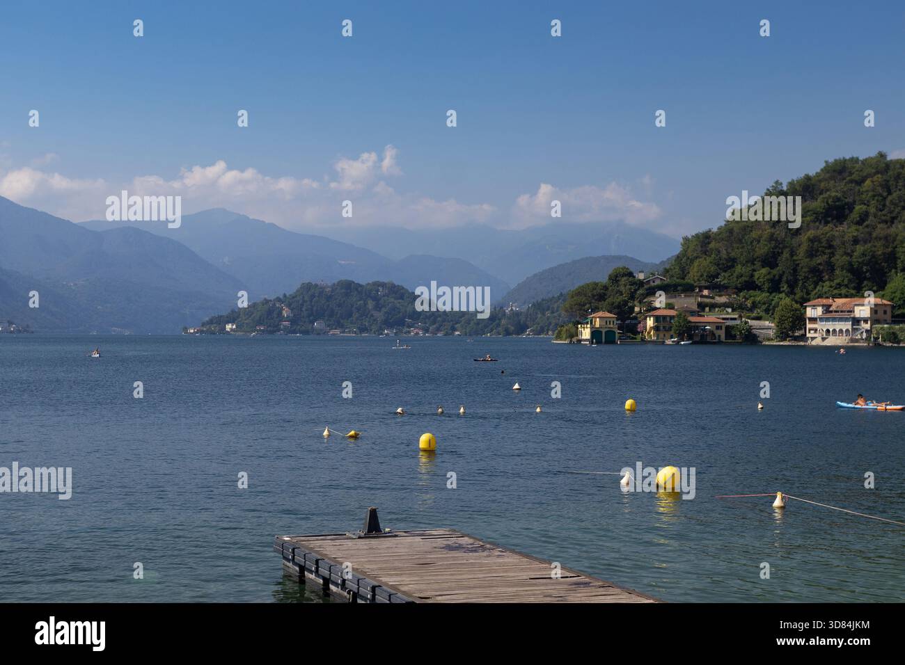 View of the beautiful Lake Orta from the popular destination Buccione Beach, in the Novara province of Piedmont in Italy. Copy space above. - Stock Image