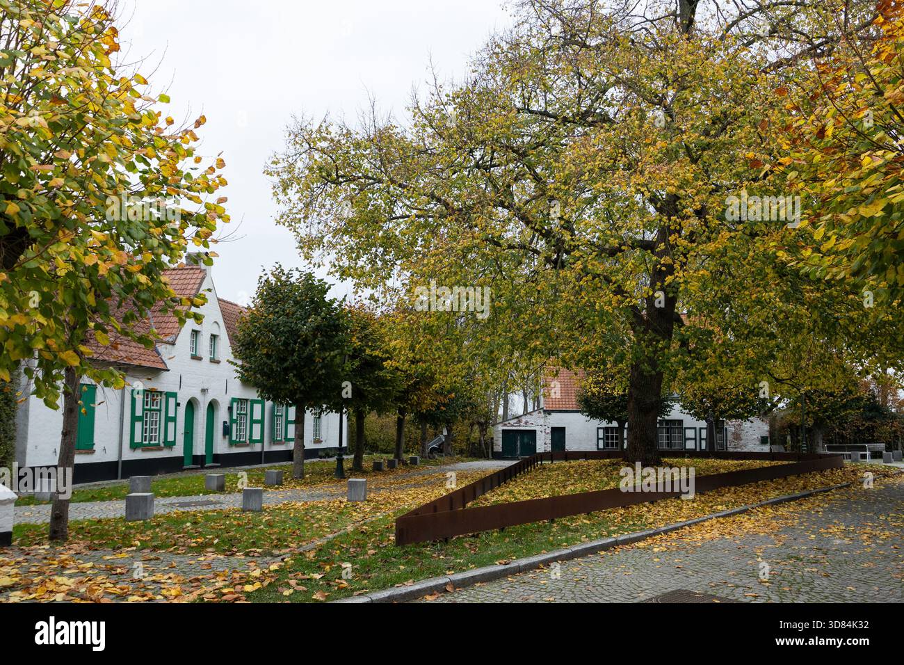 Lovely autumn view of the historic market square the 'Haringmarkt' in Damme, West Flanders, Belgium. The square is part of the historic old town and a - Stock Image