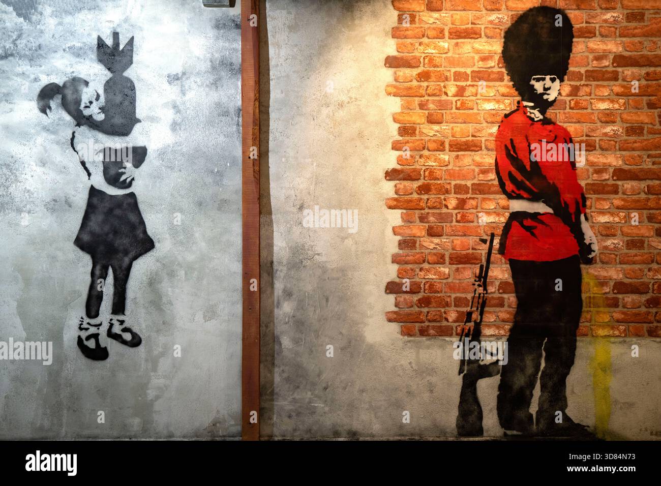 Banksy bomb hugger hi-res stock photography and images - Alamy