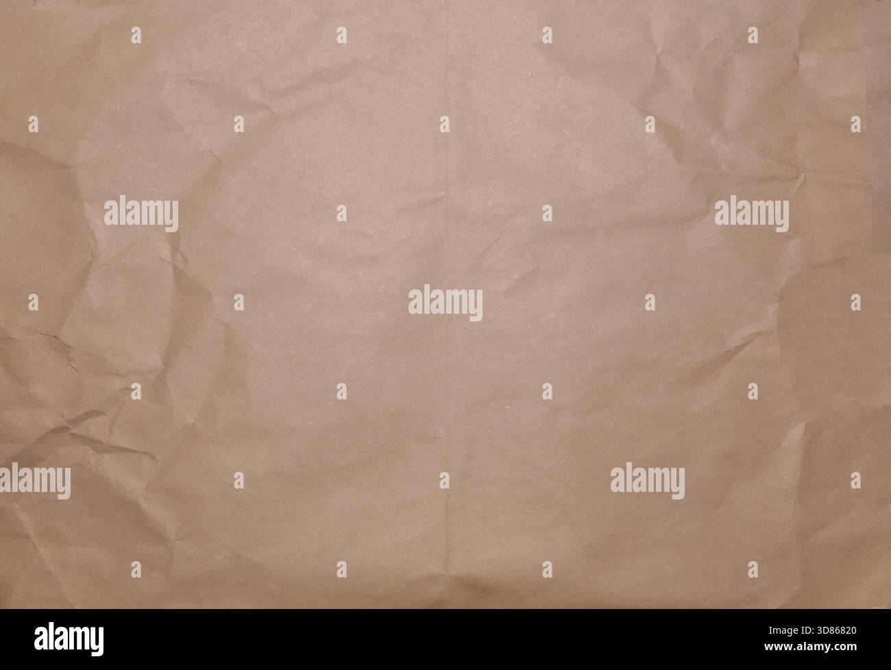 Vintage beige and brown paper sheet crumpled on the sides textured gradient frame background, copy space Stock Photo