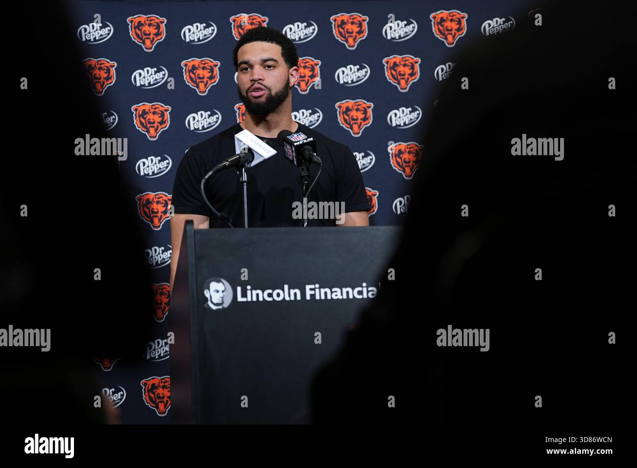 Chicago Bears quarterback Caleb Williams (18) speaks after his team's ...