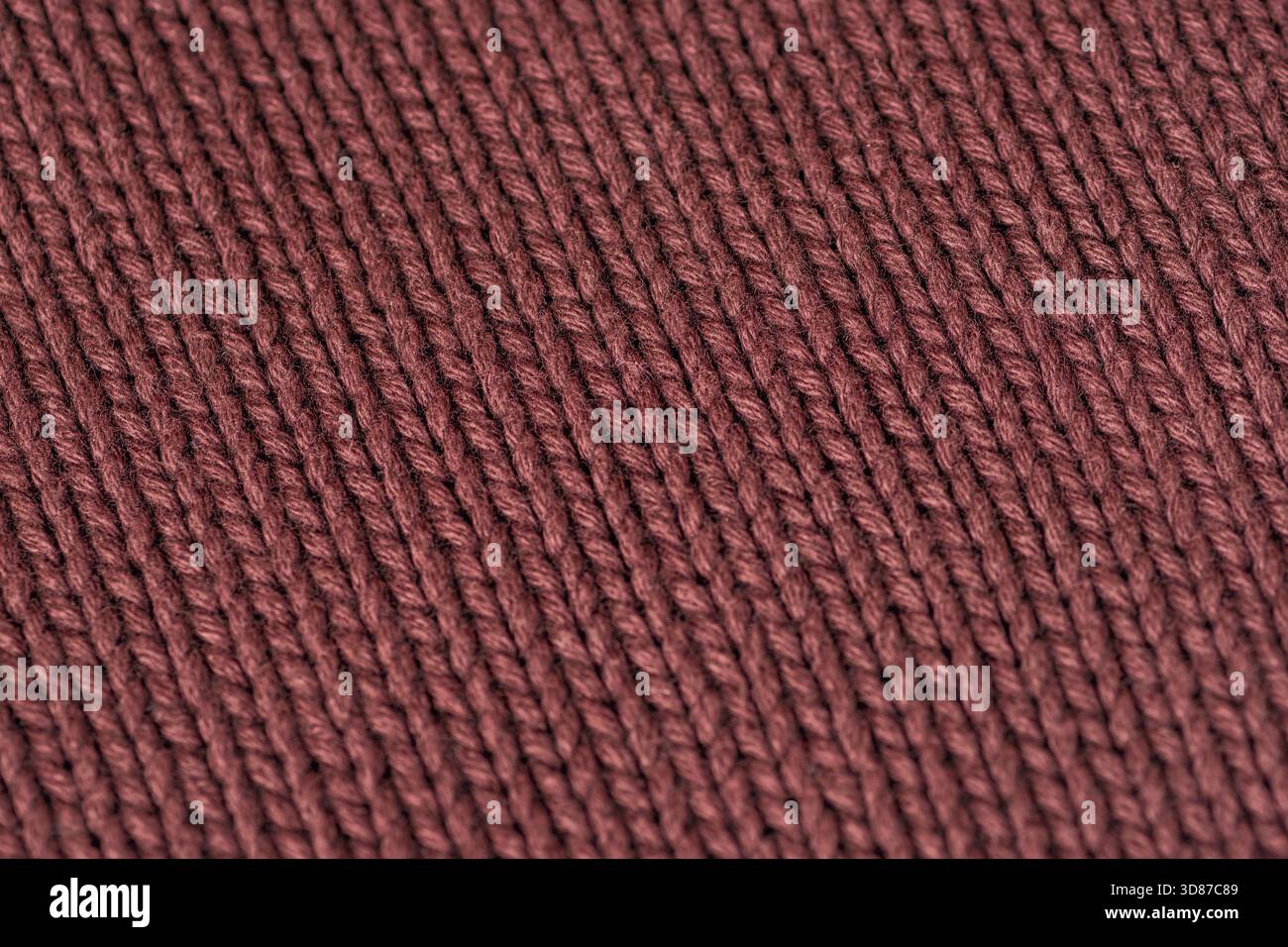 Brown knitted fabric texture, closeup. Stock Photo