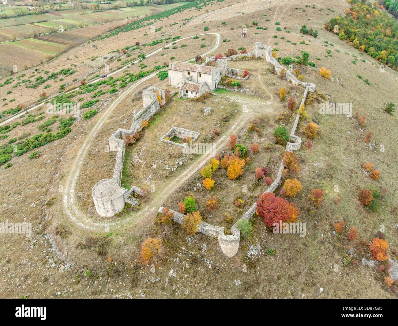 Aerial top down view of Medieval Fortress of Sant'Eusanio Forconese, Abruzzo: A strategic enlosure with five semicircular and four square towers Stock Photo