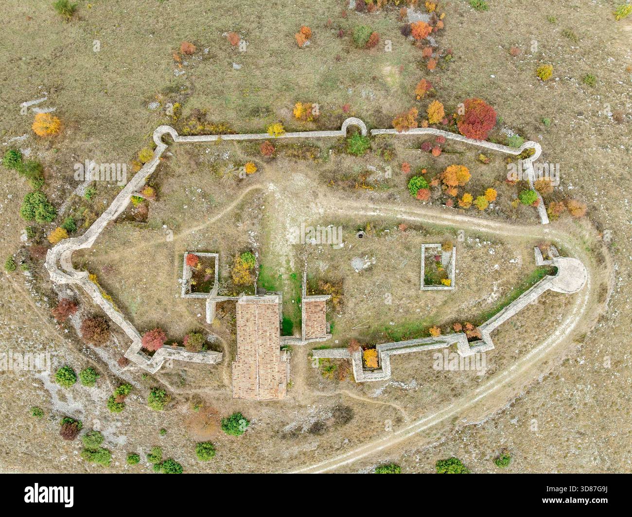 Aerial top down view of Medieval Fortress of Sant'Eusanio Forconese, Abruzzo: A strategic enlosure with five semicircular and four square towers Stock Photo