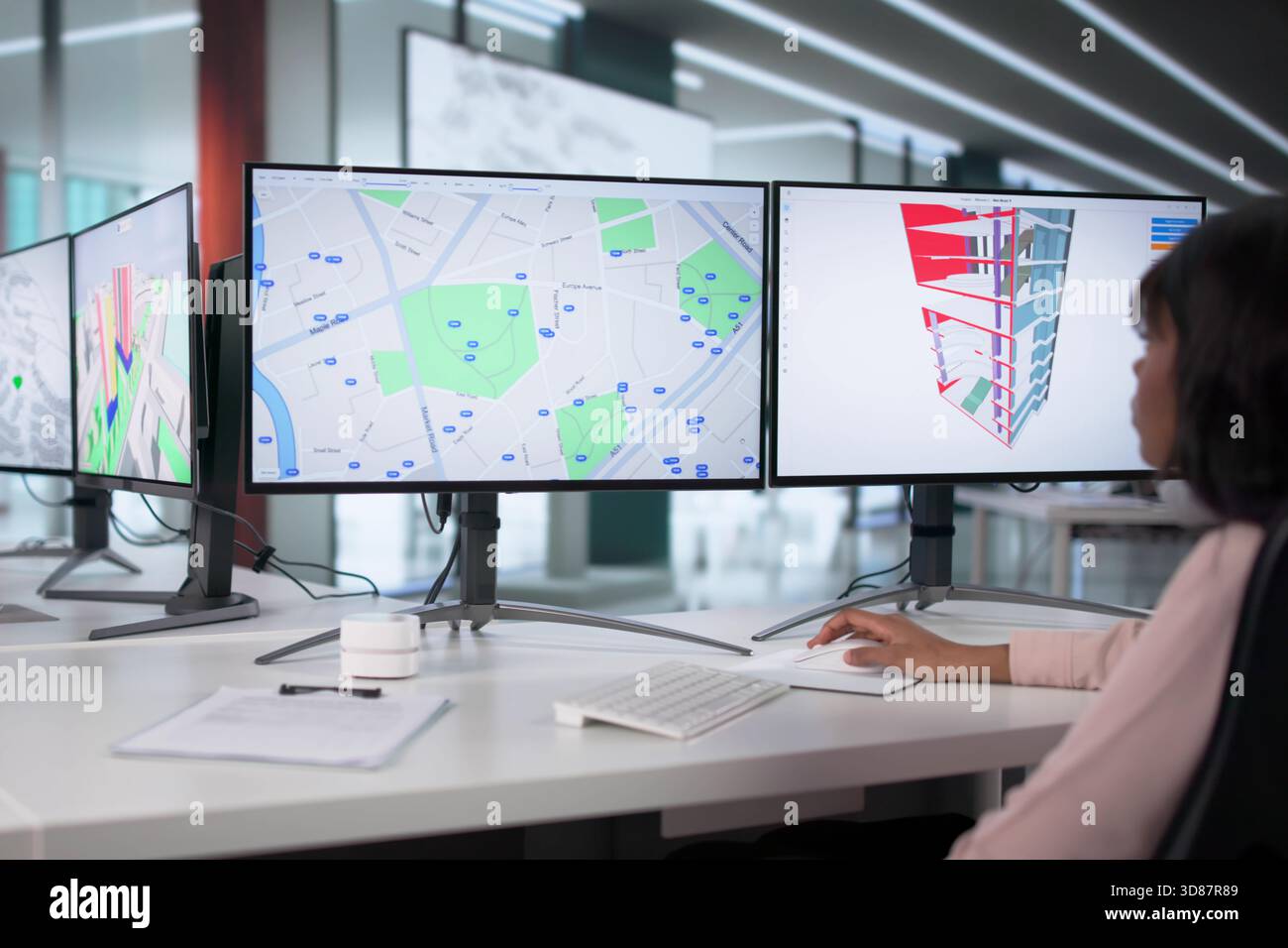 Engineers Using GIS Software Inspect Construction Project Valuation On PC. Stock Photo