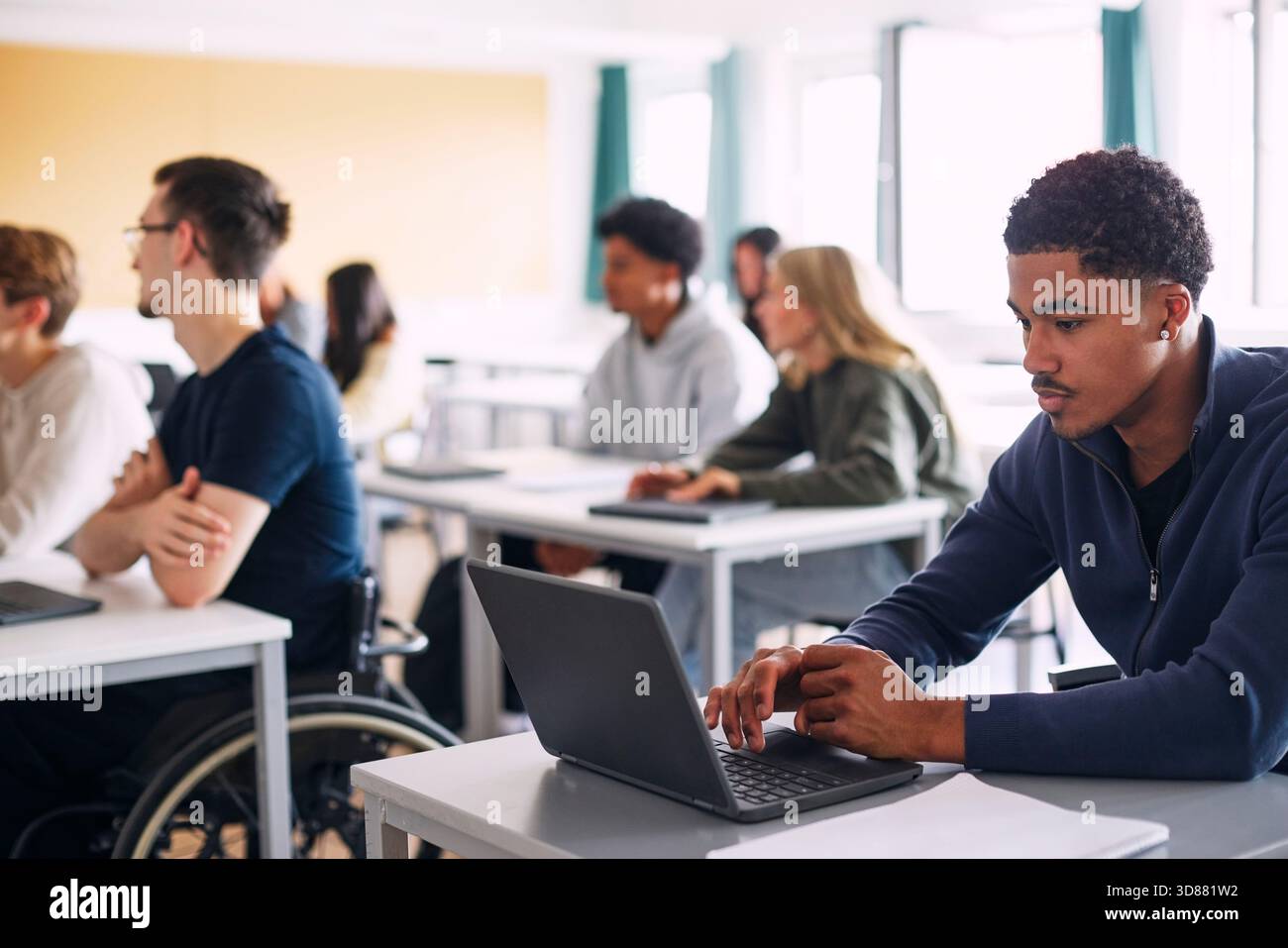 Concentrated teenage male student hi-res stock photography and images ...