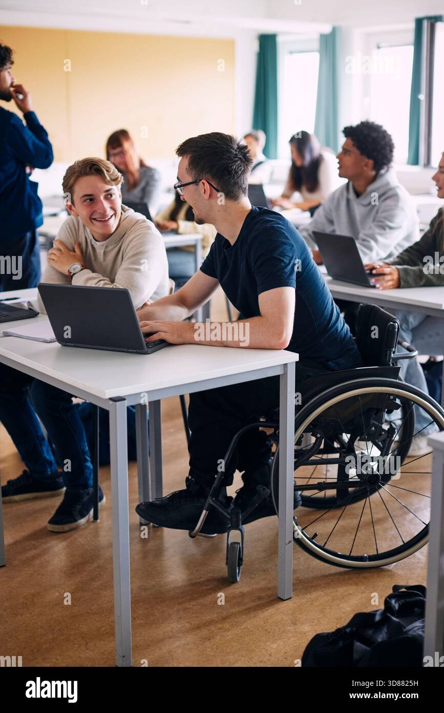 Teacher school wheelchair hi-res stock photography and images - Alamy, image size:867x1390