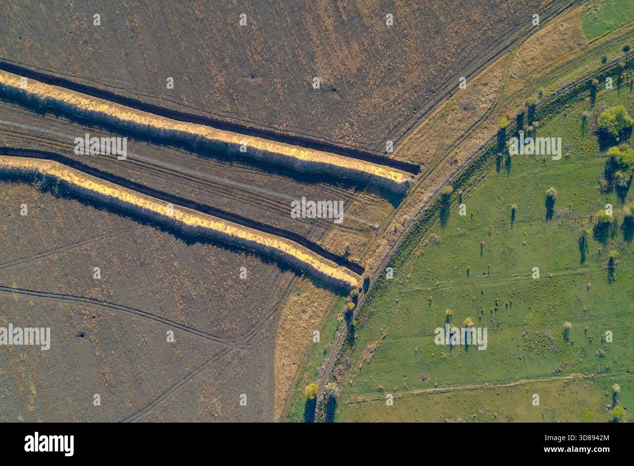 Parallel Action Shot Top-down drone shot of a strategic military defense line. Two long ...