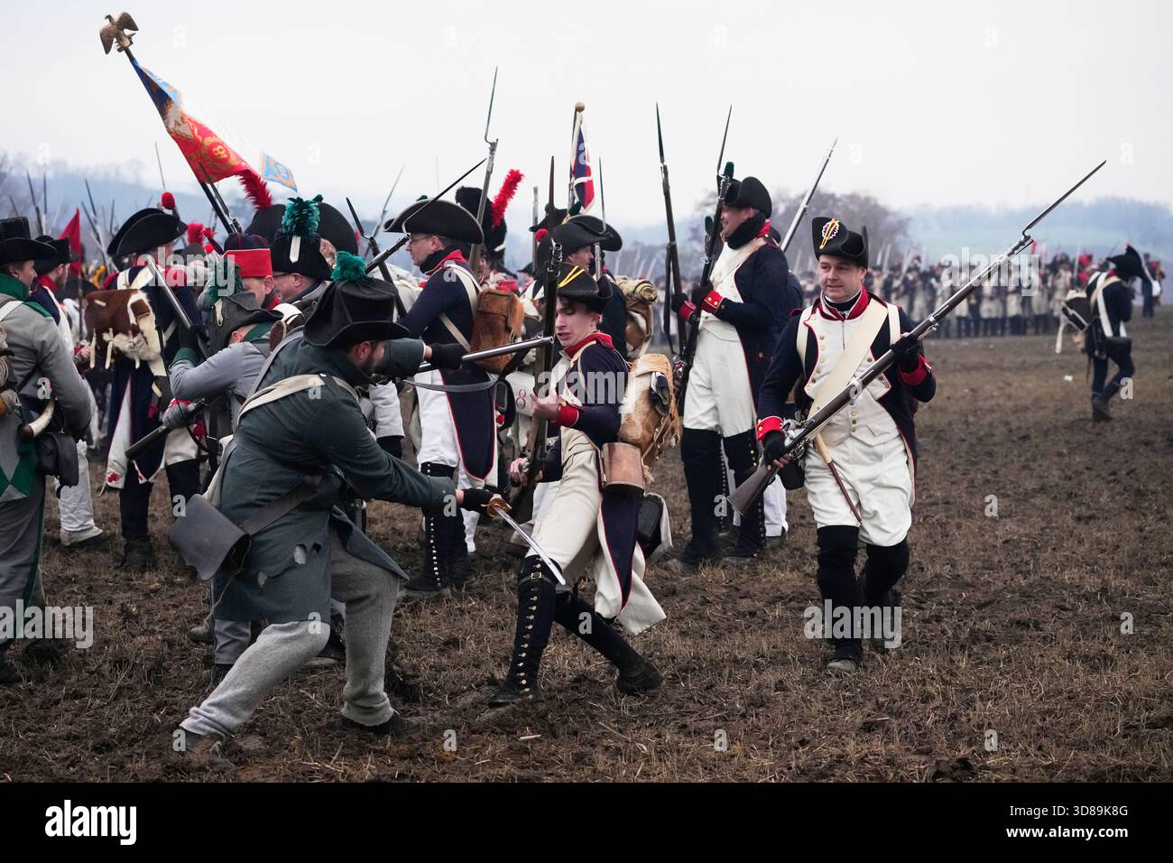 History enthusiasts dressed in regimental costumes take part in a re ...