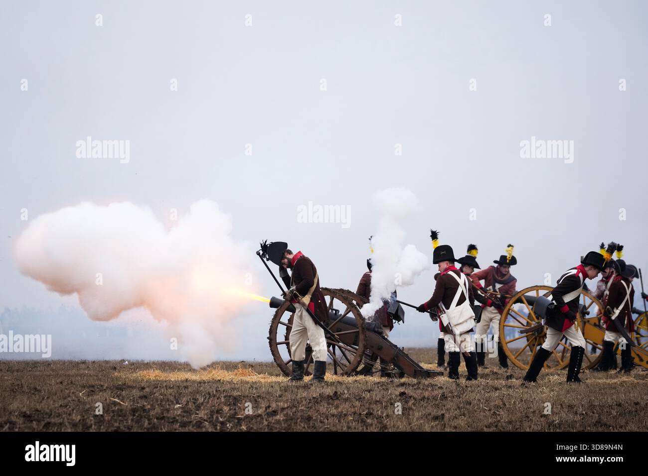 History enthusiasts dressed in regimental costumes take part in a re ...
