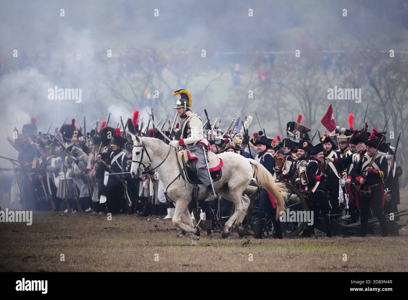 History enthusiasts dressed in regimental costumes take part in a re ...