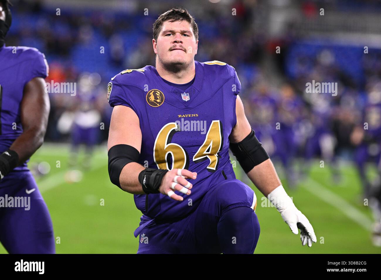 Baltimore Ravens center Tyler Linderbaum (64) warms up before an NFL ...