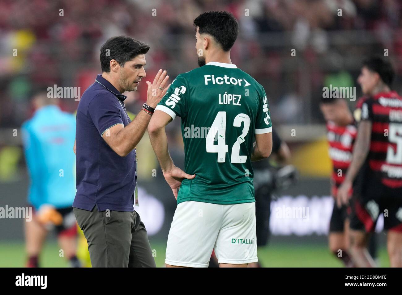 coach-abel-ferreira-of-brazil-s-palmeiras-comforts-his-player-flaco
