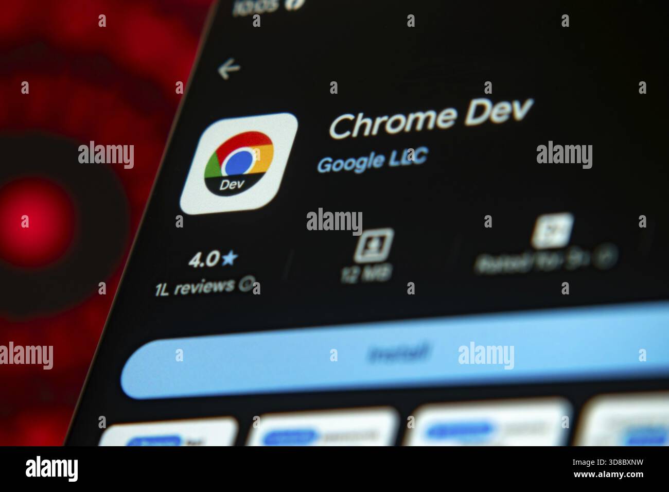 Chrome Dev app interface shown on a mobile device with a red background ...