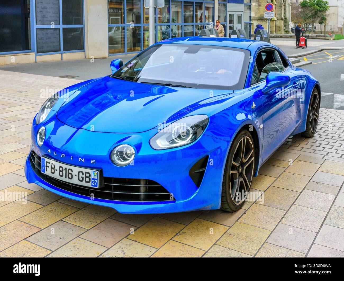 French Renault Alpine A110 sports car driving through city - Tours, Indre-et-Loire (37), France. Stock Photo