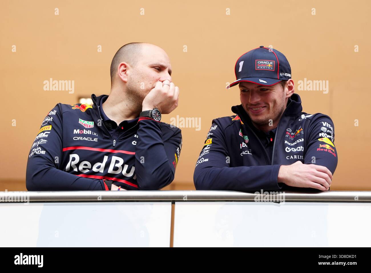 Red Bull Racing's Max Verstappen (right) with his race engineer ...
