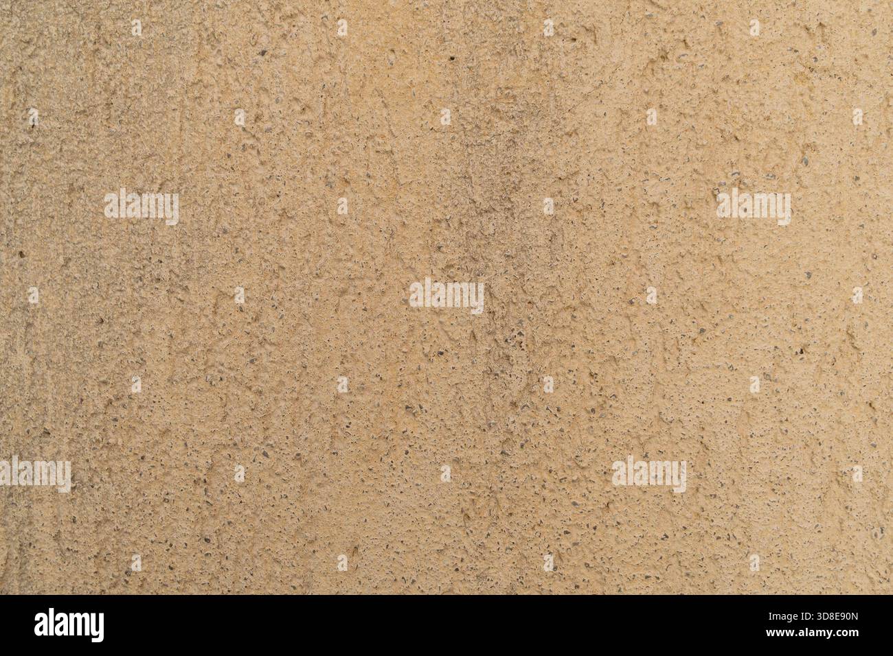 Beige rough concrete surface texture with fine details and subtle ...