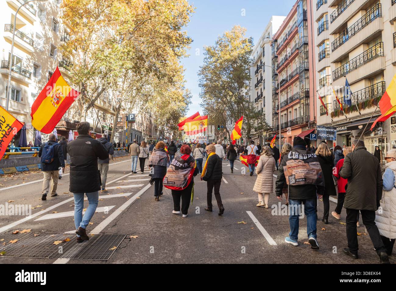 Madrid, Spain. 30 Nov 2025. Far-right protesters gather outside the ...
