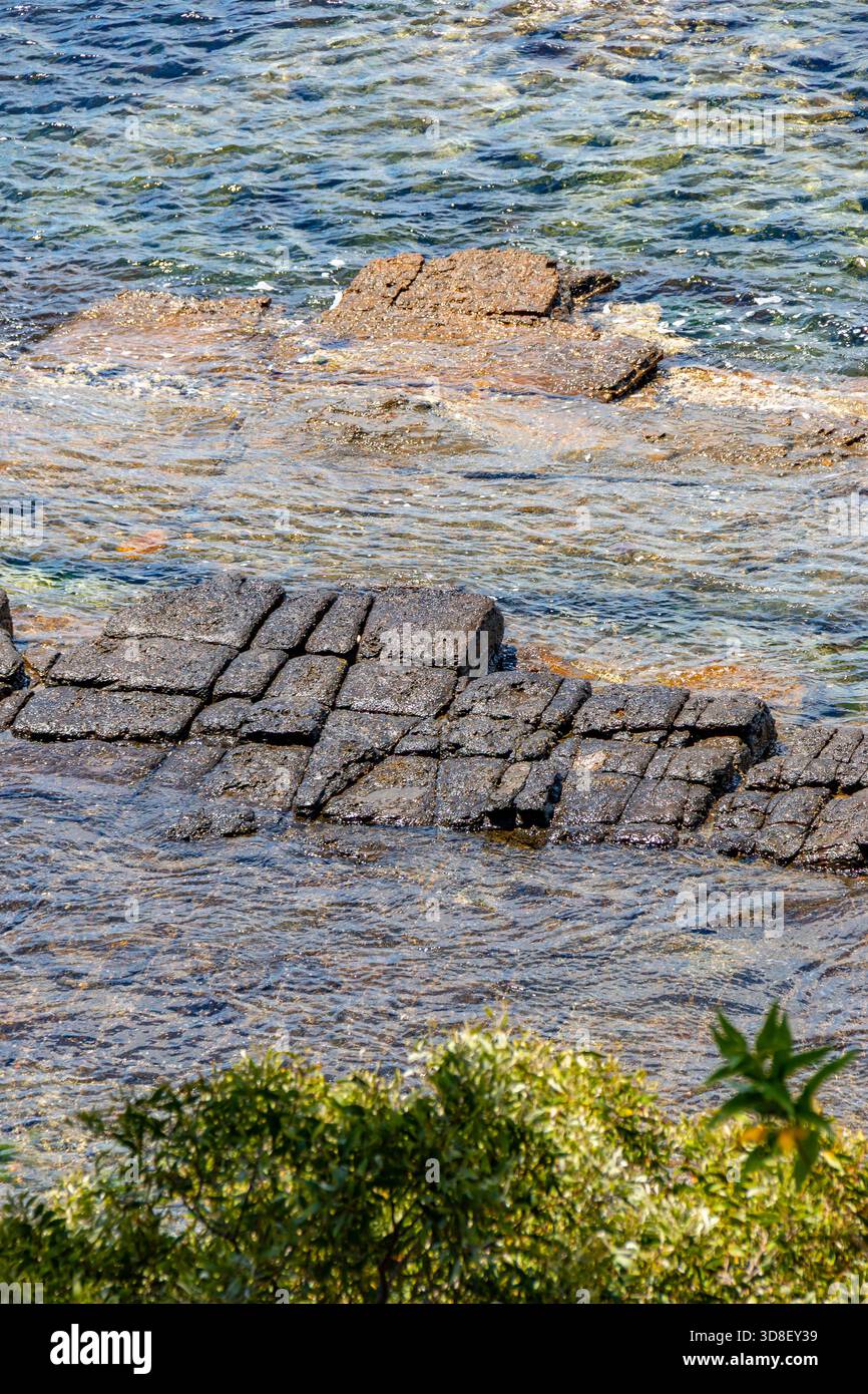 tessellated pavement rock formations at the bottom of the Alam cliffs ...